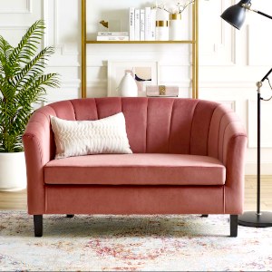 pink small corner love seat for a compact office space